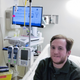 Cedars-Sinai patient. You can see the Amazon Echo mounted on the wall behind him.